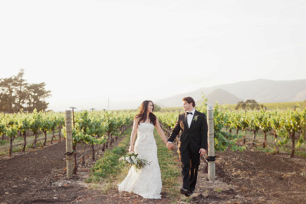 Bride and Groom walking at Biddle Ranch Wedding by Sandcastle Celebrations Wedding Planner