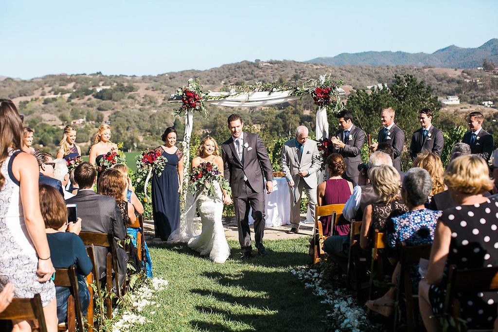 Bride and groom exit at Casitas Estate Wedding by Sandcastle Celebrations Wedding Planning