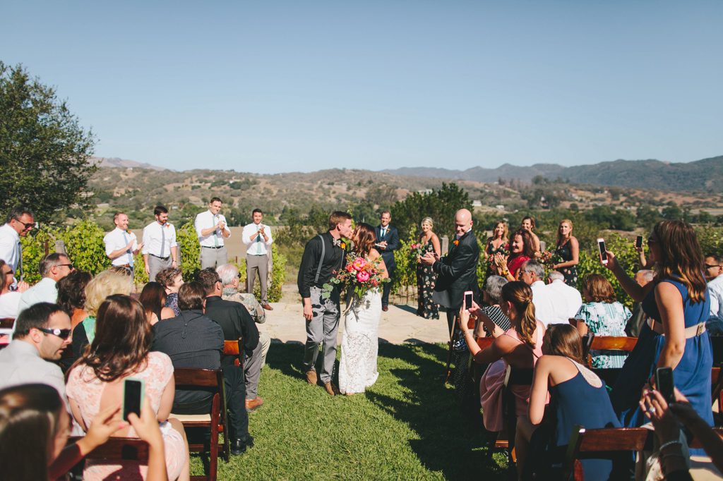 kissing at Casitas Estate Wedding by Sandcastle Celebrations Wedding Planning