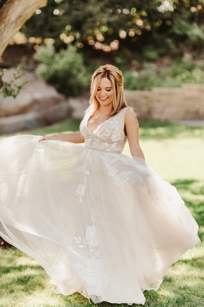 Bride twirling gown