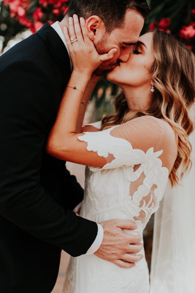 Bride and Groom Kiss designed by Wedding Planner Sandcastle Celebrations