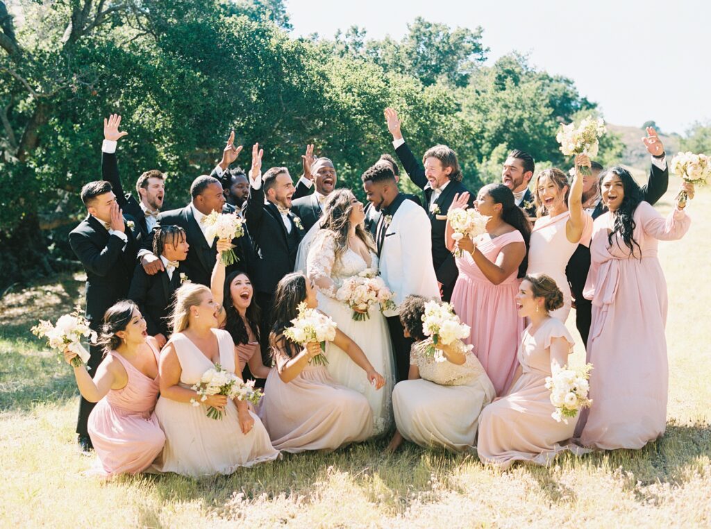 Wedding party in field at La Cuesta Ranch Wedding Designed by Janet Tacy of San Luis Obispo Wedding Planner Sandcastle Celebrations captured by Jen Rodriguez Photography