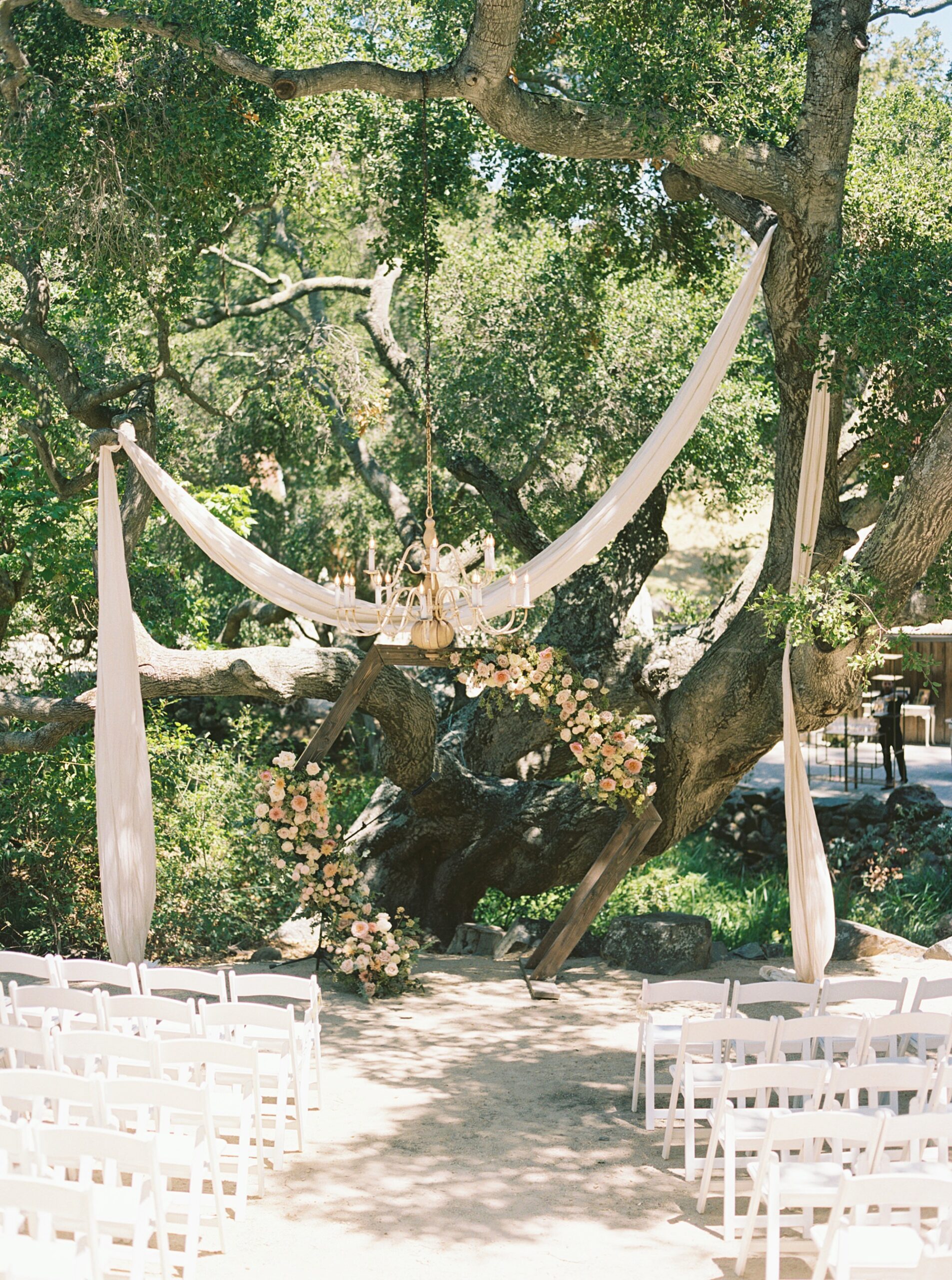 Ceremony under oak tree with octagon arbor at La Cuesta Ranch Wedding Designed by Janet Tacy of San Luis Obispo Wedding Planner Sandcastle Celebrations captured by Jen Rodriguez Photography