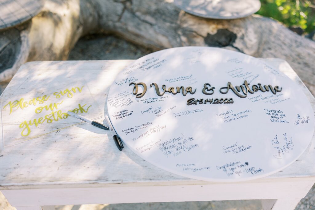 circle sign as welcome book at La Cuesta Ranch Wedding Designed by Janet Tacy of San Luis Obispo Wedding Planner Sandcastle Celebrations captured by Jen Rodriguez Photography