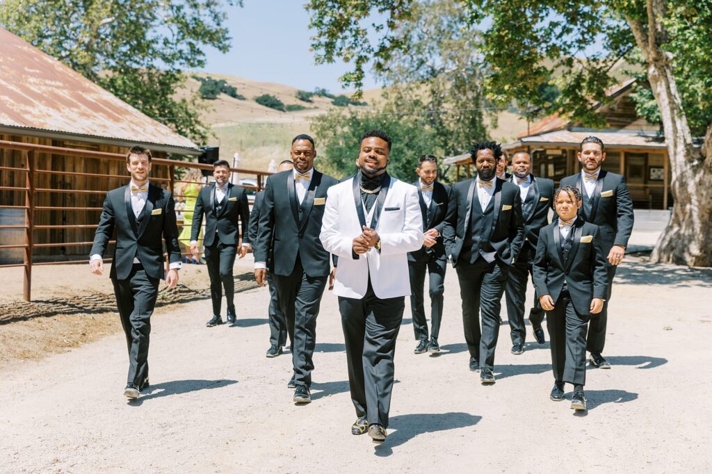 Black gold and white suits at La Cuesta Ranch Wedding Designed by Janet Tacy of San Luis Obispo Wedding Planner Sandcastle Celebrations captured by Jen Rodriguez Photography