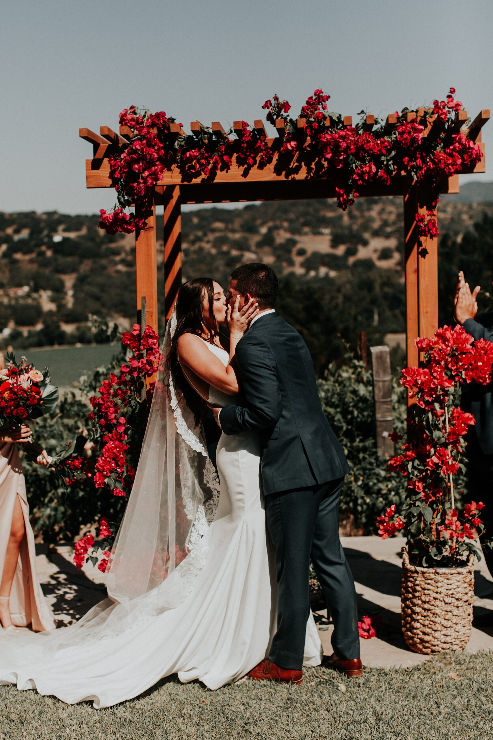 First kiss at Japanese infused wedding at the Arroyo Grande Casitas Estate Wedding by SLO Wedding Planner Sandcastle Celebrations