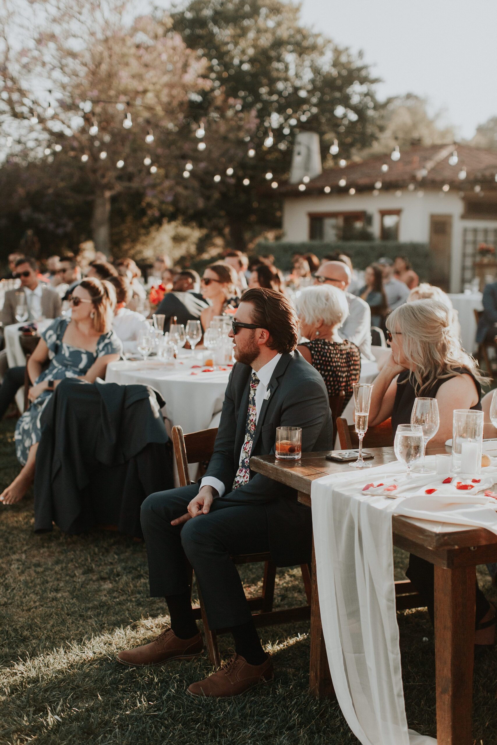 Guests enjoy toasts at Japanese infused wedding at the Arroyo Grande Casitas Estate Wedding by SLO Wedding Planner Sandcastle Celebrations